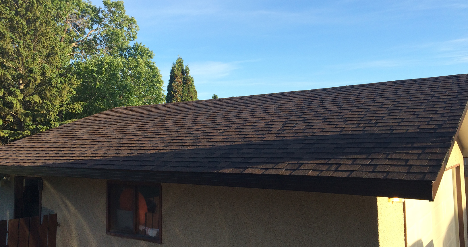 J&M Roofing Services: Asphalt Shingle Residential Garage Roof